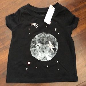 Gymboree black shirt with a moon and star design .